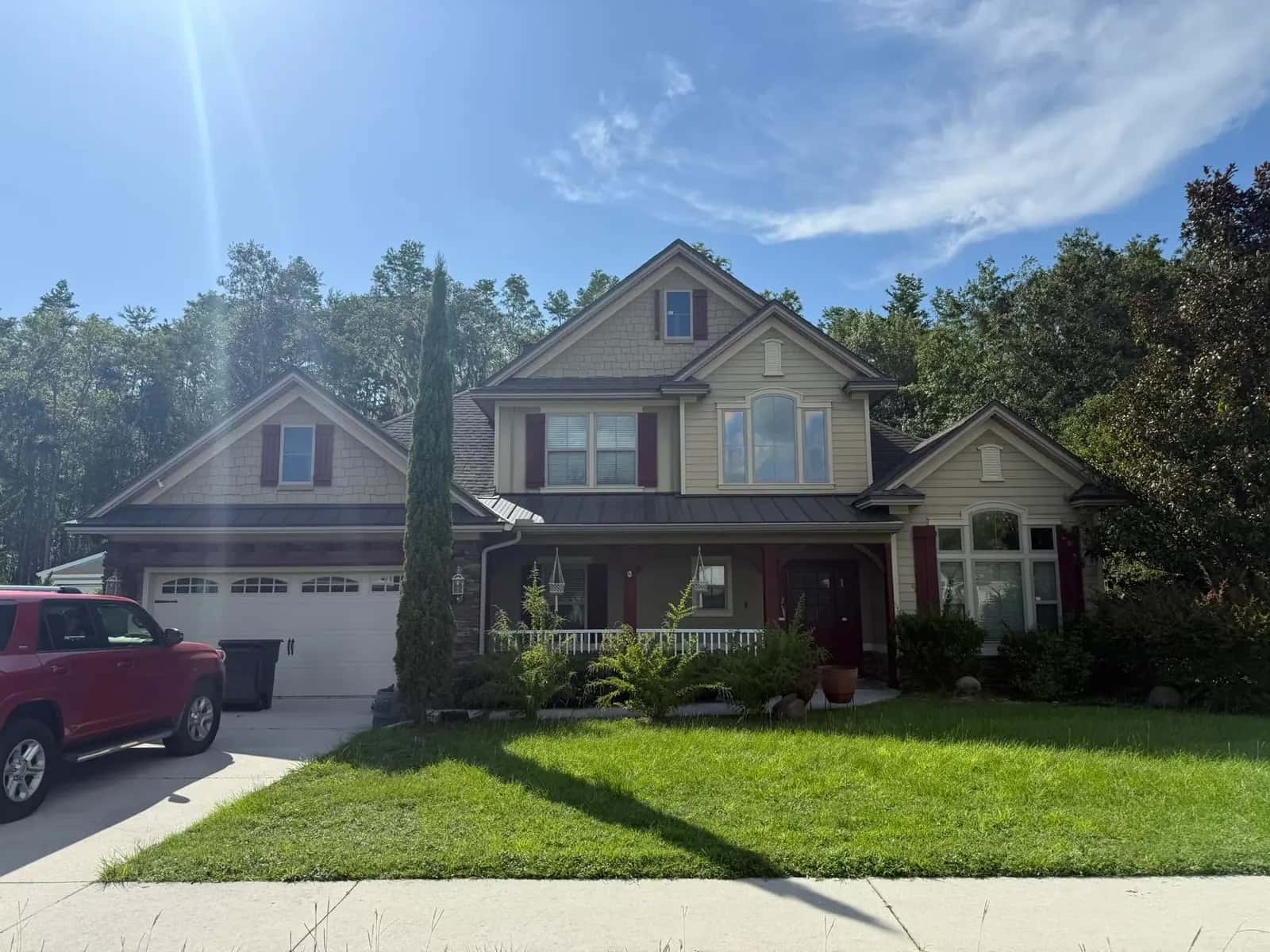 Completed dark architectural shingle roof by Powell and Sons